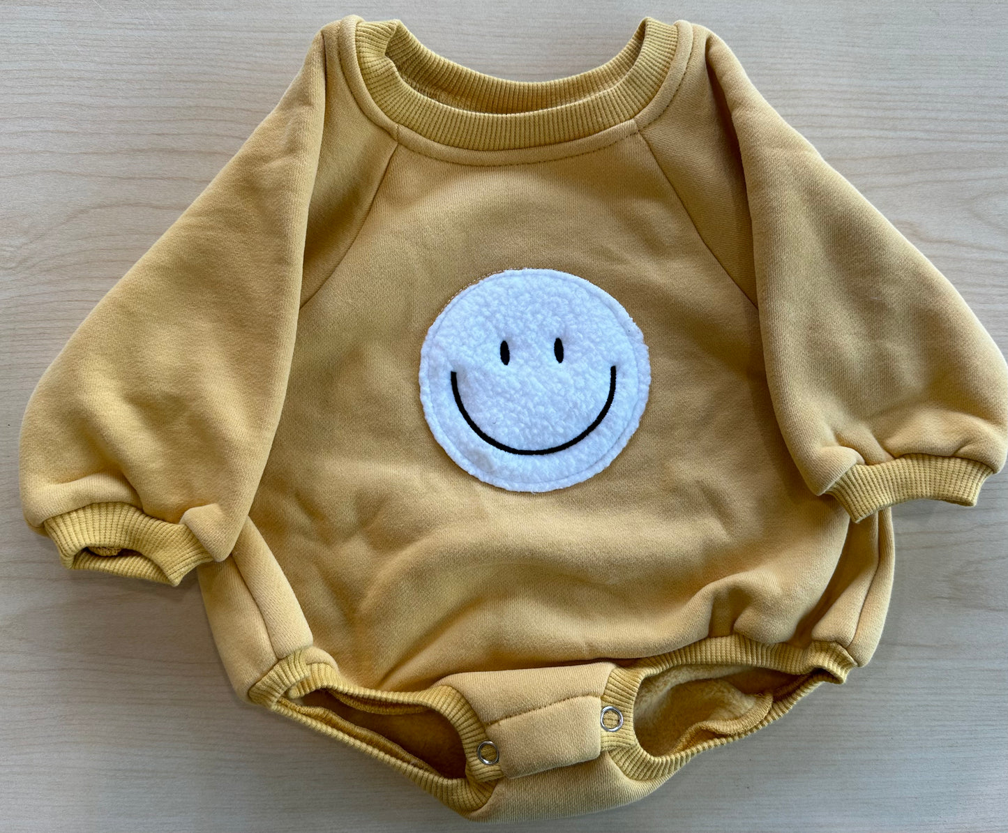 SMILEY FACE ROMPER